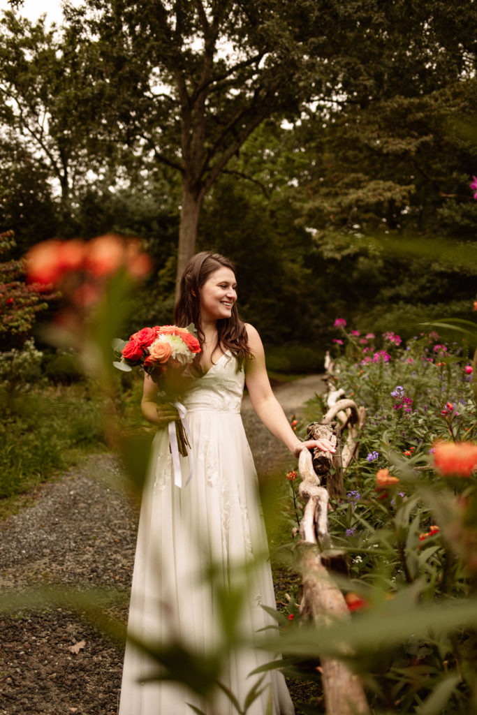 Bride in the botanical gardens at her elopement
