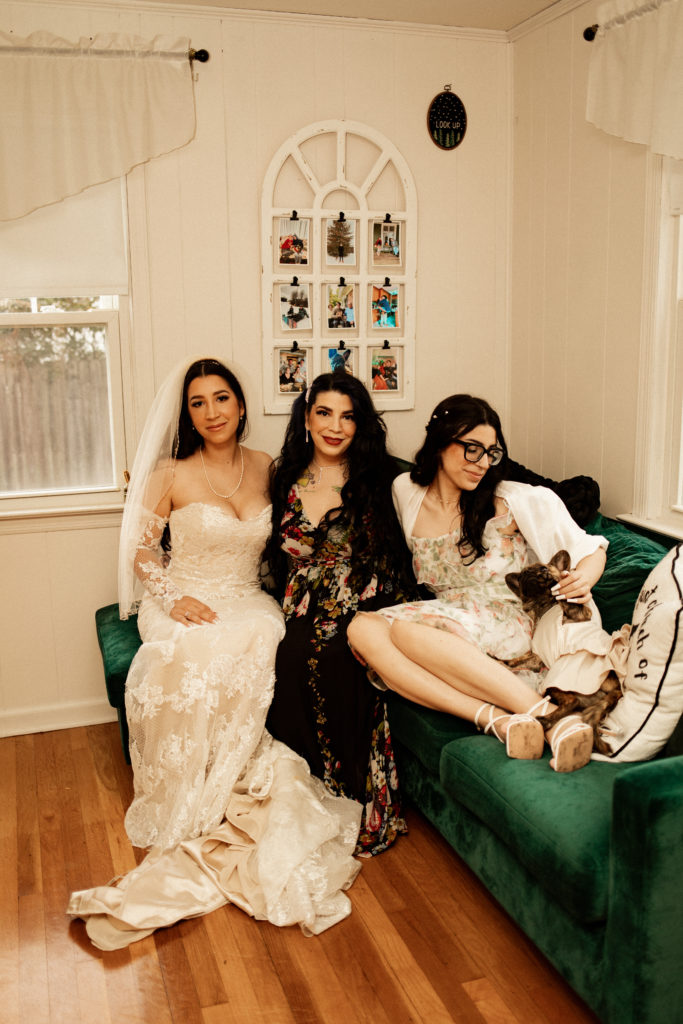 bride on couch with her mom and sister