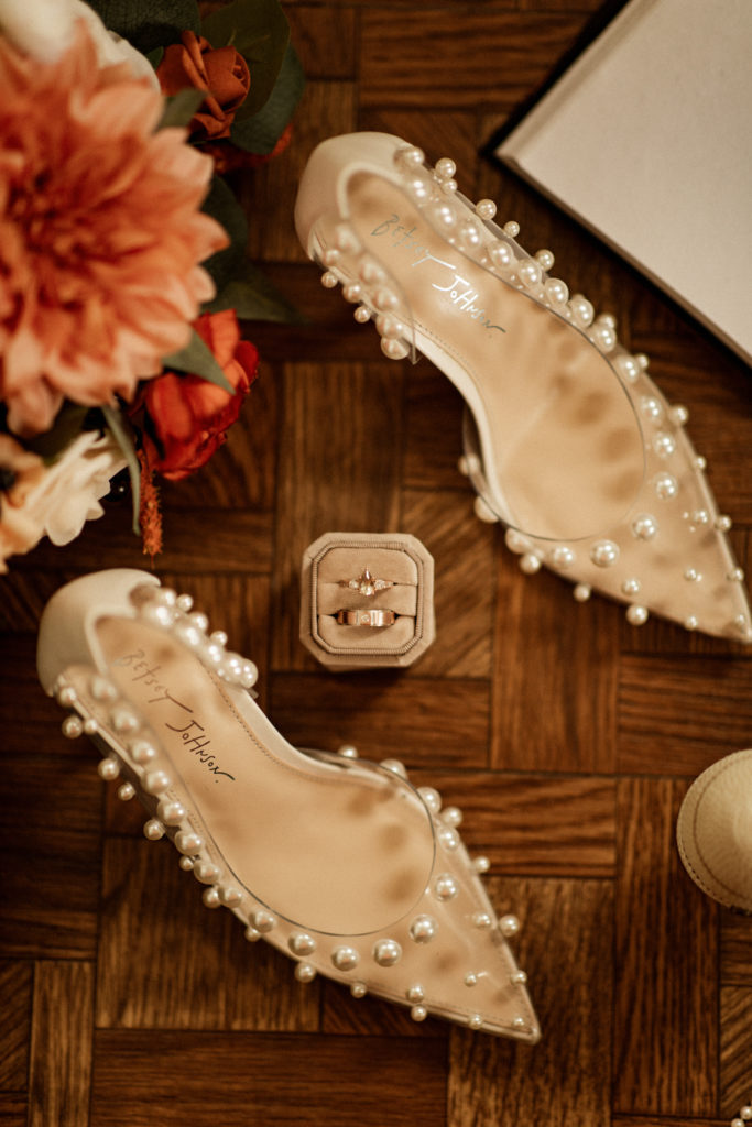 details of bride shoes and rings