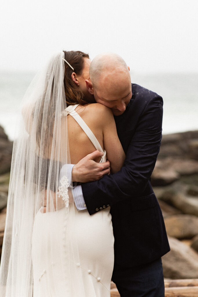 Sand Beach elopement in Acadia National Park in a storm
