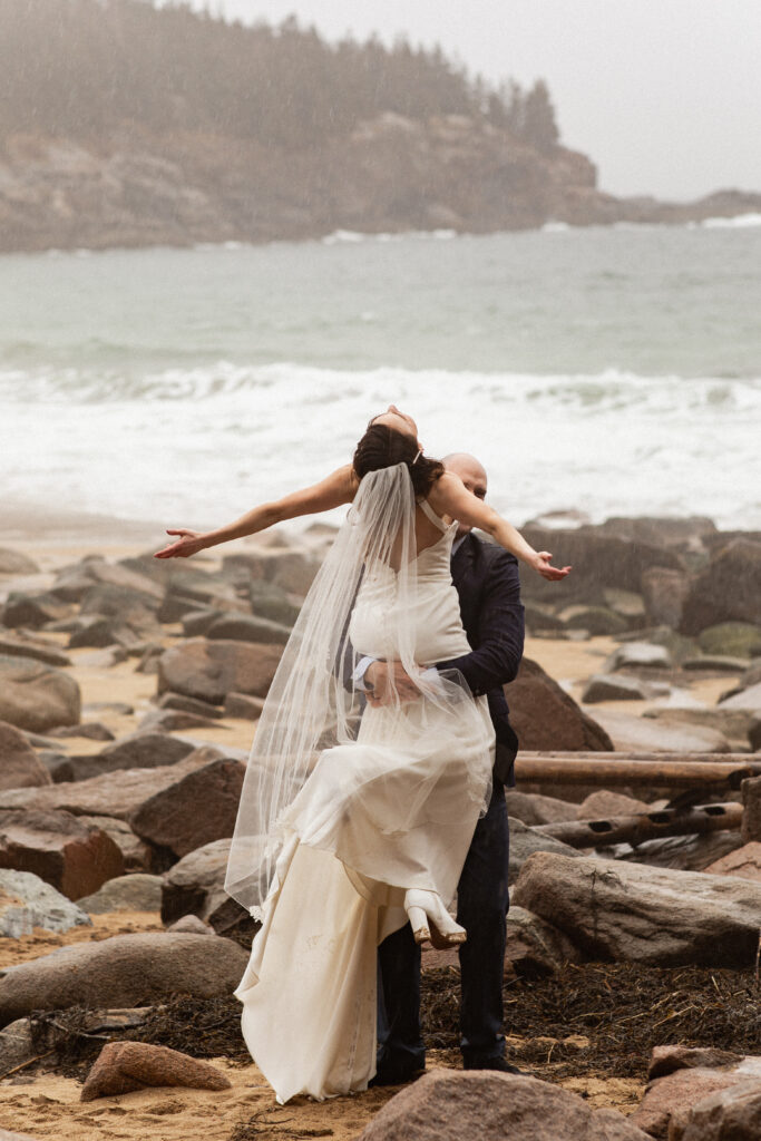 Sand Beach adventure elopement in Acadia National Park spinning