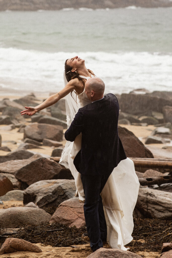 Spinning on Sand Beach adventure elopement in Acadia National Park