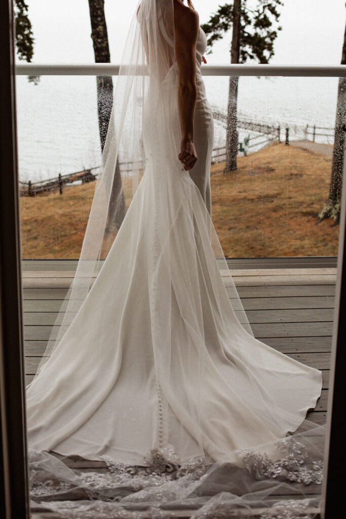 Bride in vintage setting on balcony in Acadia National Park for adventure elopement