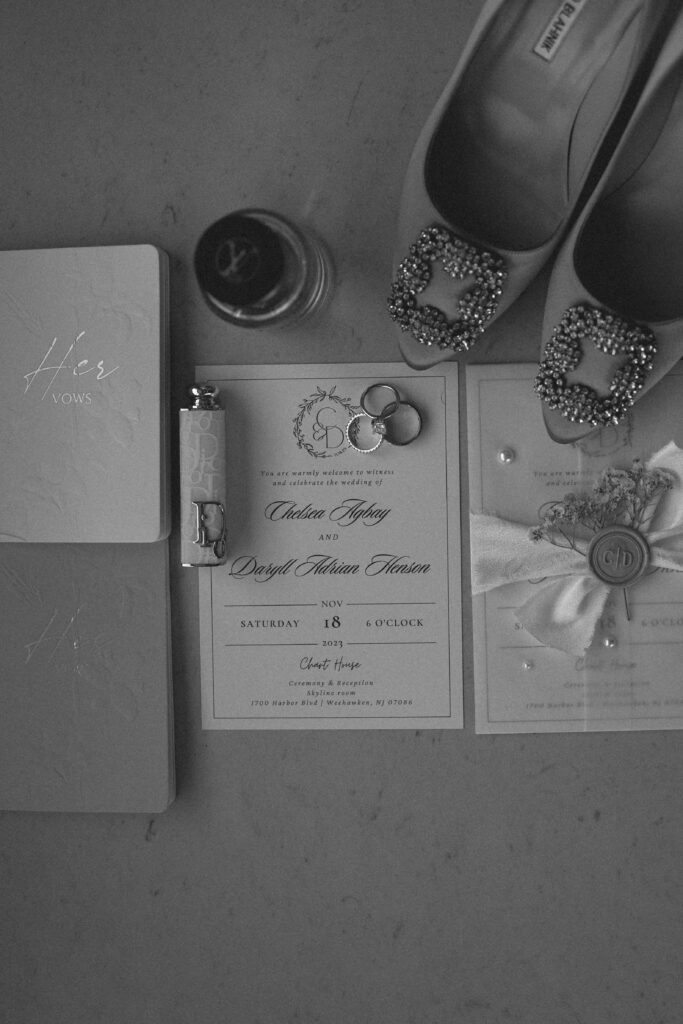 Detail photos of their intimate wedding at Chart House in Weehawken, NJ in black and white