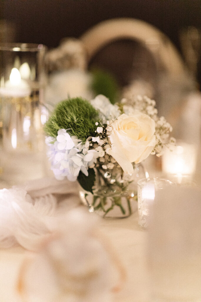 Detail photos of their intimate wedding at Chart House in Weehawken, NJ of their tables