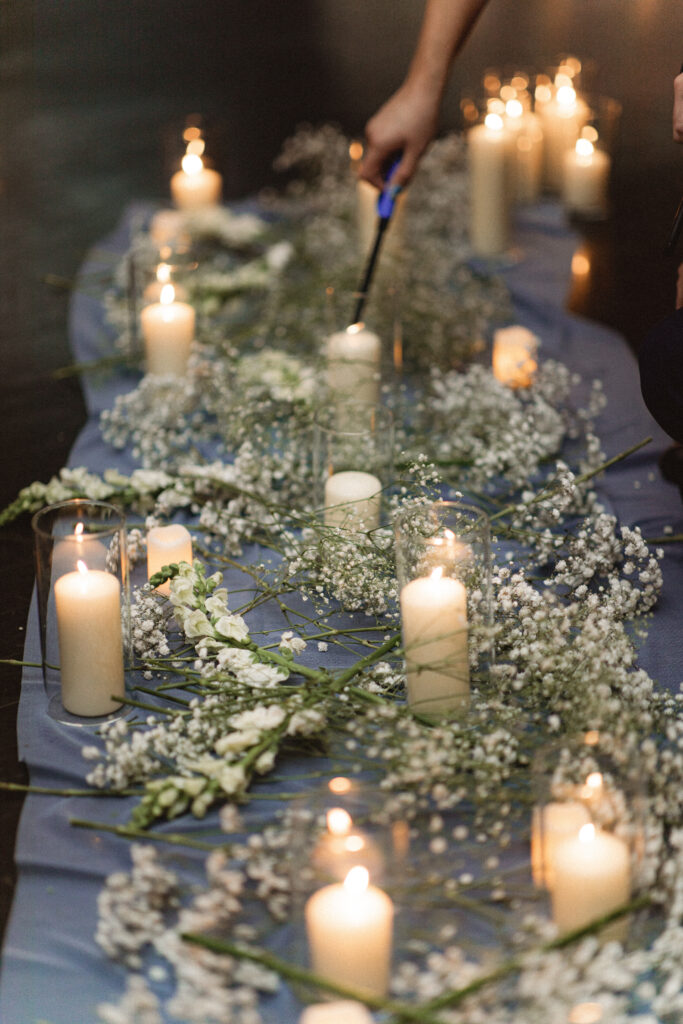 Detail photos of their intimate wedding at Chart House in Weehawken, NJ of their candles