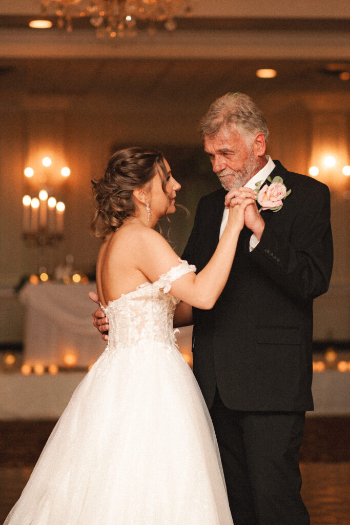 Briana dancing with her father during the wedding reception.

