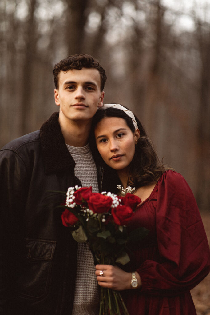 photo of a couple, in the woods, scenic background