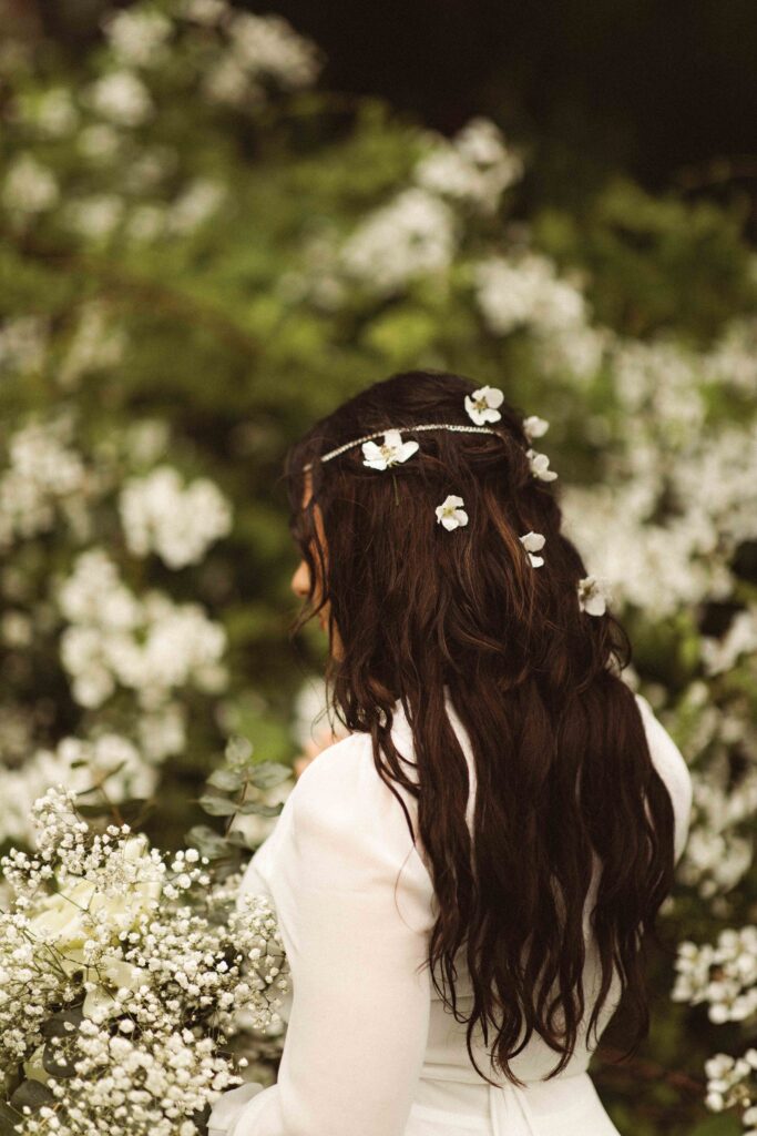 Adventure elopement at Thompson Park in nature and flowers in her hair