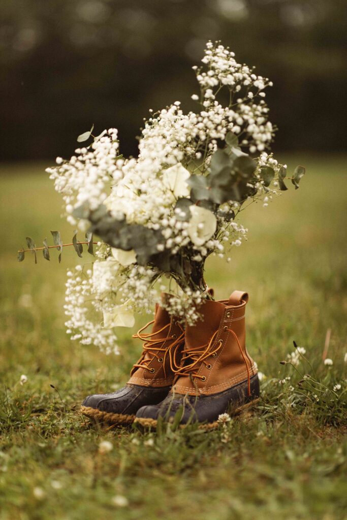 Adventure elopement at Thompson Park in nature with hiking boots