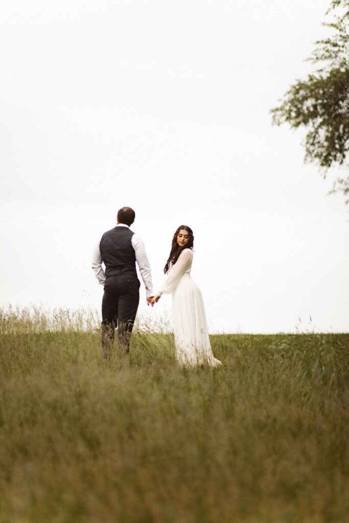 Adventure elopement at Thompson Park in nature in the rain